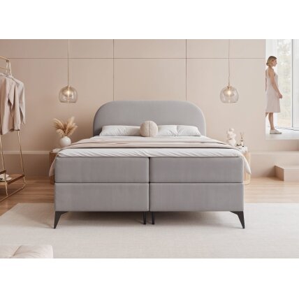 Kontinentinė lova ant kojelių NOELIA su patalynės dėže Miegojimo plotas: 180x200 cm, Spalva: Jasmine 90 (Pilka), Topperis: taip 2 Kontinentinė lova ant kojelių NOELIA su patalynės dėže Miegojimo plotas: 180x200 cm, Spalva: Jasmine 90 (Pilka), Topperis: taip 2